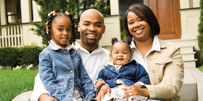 Family On House Steps | Family Flooring Idaho | Bonners Ferry, Idaho